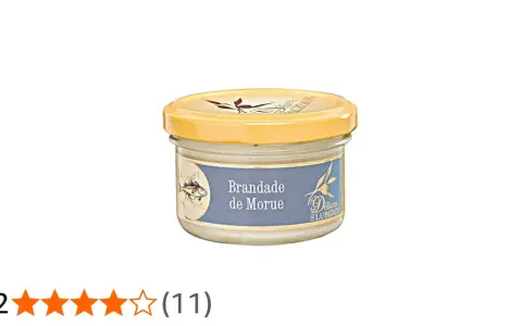 Glas mit Brandade de Morue, einer cremigen Kabeljaupaste, mit einem Fischmotiv auf dem Etikett.