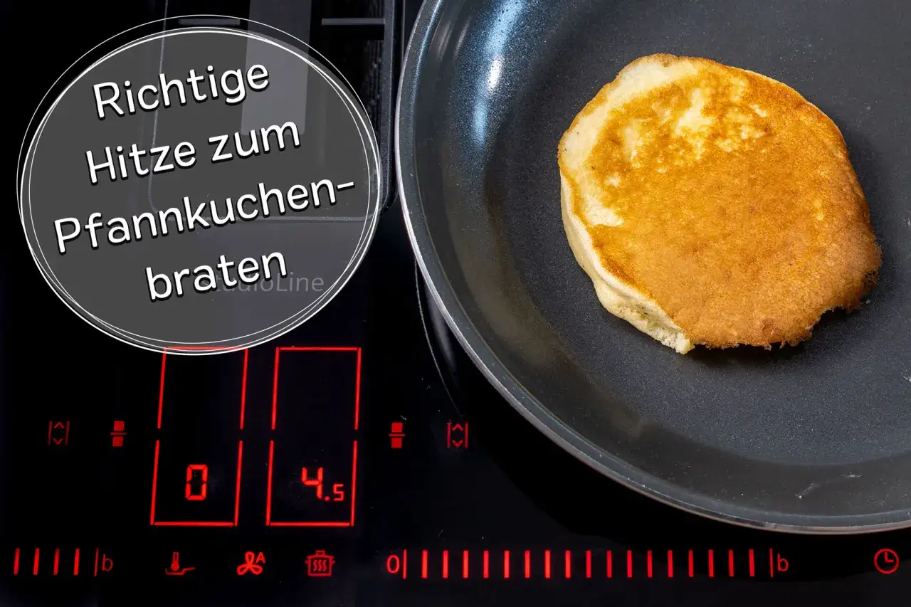 Ein goldbrauner Pfannkuchen br&auml;t in einer Pfanne. Die Induktionskochplatte zeigt die richtige Hitze f&uuml;r das Pfannkuchen-Rezept.